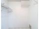 Walk-in closet with shelving and white tile flooring at 2937 Stilwell Ct, New Port Richey, FL 34655