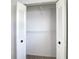 Walk-in closet featuring built-in shelving at 2937 Stilwell Ct, New Port Richey, FL 34655