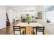 Well-designed kitchen with stainless steel appliances and an adjacent dining area at 3114 E 21St Ave, Tampa, FL 33605