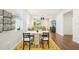 Inviting living space featuring modern decor, a dining table, and a comfortable seating area at 3114 E 21St Ave, Tampa, FL 33605