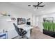 Second-floor office area featuring modern decor, an ergonomic chair, and contemporary artwork at 32203 Mahogany Valley Dr, Wesley Chapel, FL 33543