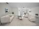Inviting living room featuring neutral decor and an open layout perfect for relaxing and entertaining at 3411 Glossy Ibis Ct, Palm Harbor, FL 34683