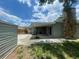 The spacious backyard has a covered patio, shed, and privacy fence at 3803 43Rd N Ave, St Petersburg, FL 33714