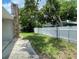 The backyard features a concrete patio and wood fence at 3803 43Rd N Ave, St Petersburg, FL 33714