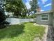 Fenced in backyard of this home with trees providing plenty of shade at 3803 43Rd N Ave, St Petersburg, FL 33714