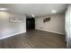 A view of the living room showcases the home's layout and access to the kitchen at 3803 43Rd N Ave, St Petersburg, FL 33714