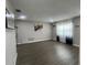 Large living room featuring neutral paint, modern hard surface floors, and large windows at 3803 43Rd N Ave, St Petersburg, FL 33714