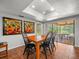 Comfortable dining room featuring tile floors and sliding glass doors at 4118 Carrollwood Village Dr, Tampa, FL 33618