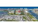 Aerial view of the condo buildings near the bay, overlooking the water and nearby marina at 423 150Th Ave # 1501, Madeira Beach, FL 33708