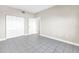 Bedroom featuring double closets and tile flooring at 423 150Th Ave # 1501, Madeira Beach, FL 33708