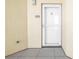 Inviting entrance with white door and tiled floor, numbered 1501 at 423 150Th Ave # 1501, Madeira Beach, FL 33708
