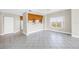Bright, open living room with tile floors, large window with neighborhood views and eat-in kitchen at 423 150Th Ave # 1501, Madeira Beach, FL 33708