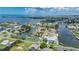 Expansive aerial view of waterfront properties, perfect for fishing enthusiasts and water lovers at 4279 Newport Dr, Hernando Beach, FL 34607