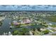 Aerial perspective of waterfront homes, providing a sense of community and waterside living at 4279 Newport Dr, Hernando Beach, FL 34607