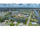High-angle shot of waterfront properties, ideal for boaters and those seeking coastal living at 4279 Newport Dr, Hernando Beach, FL 34607