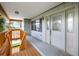 Inviting entrance with decorative glass front door and spacious covered porch area at 4279 Newport Dr, Hernando Beach, FL 34607