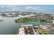 A beautiful waterfront condo community with boat docks, tennis courts and manicured lawns provides a resort lifestyle at 450 Treasure Isle Causeway # 411, Treasure Island, FL 33706