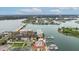Picturesque aerial view highlighting waterfront condos, private marina, and access to intercoastal waterways at 450 Treasure Isle Causeway # 411, Treasure Island, FL 33706