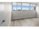 Bright bedroom with updated flooring and large windows that let in tons of natural light at 450 Treasure Isle Causeway # 411, Treasure Island, FL 33706
