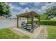 Backyard featuring a gazebo with outdoor seating and a grill, great for relaxing or entertaining at 4518 Ashmore Dr, Tampa, FL 33610