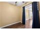 Bedroom featuring neutral-colored walls and wood flooring at 525 38Th S St, St Petersburg, FL 33711