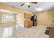 Open-concept kitchen and dining area featuring tile floors and modern appliances at 525 38Th S St, St Petersburg, FL 33711