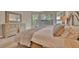 Comfortable bedroom with a well-lit and calm environment, perfect for relaxation at 5320 Morey Farms Loop, Palmetto, FL 34221
