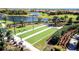Aerial of bocce ball courts and landscape that overlooks the lake at 5320 Morey Farms Loop, Palmetto, FL 34221