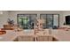 Bright kitchen featuring an island with bar seating, modern sink, and ample counter space at 5320 Morey Farms Loop, Palmetto, FL 34221