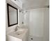 Clean and functional bathroom featuring a modern vanity and shower at 5507 Casino Dr, Holiday, FL 34690