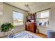 Cozy dining area with waterfront views, classic hutch, and stylish blue rug at 5722 Biscayne Ct # 107, New Port Richey, FL 34652