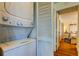 Stackable laundry area near bedroom with washer and dryer at 5722 Biscayne Ct # 107, New Port Richey, FL 34652