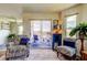 Cozy living space features stylish furniture and sliding glass doors to the lanai at 5722 Biscayne Ct # 107, New Port Richey, FL 34652