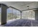 Well-lit parking garage space with a lattice privacy screen providing security at 5722 Biscayne Ct # 107, New Port Richey, FL 34652