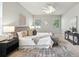 Bedroom featuring carpeted floors, ceiling fan and modern furnishings at 5962 Lexington Dr, Parrish, FL 34219