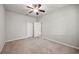 Bedroom featuring carpeted floors, ceiling fan and closet space at 5962 Lexington Dr, Parrish, FL 34219
