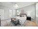 Bedroom featuring a ceiling fan and modern furnishings at 5962 Lexington Dr, Parrish, FL 34219