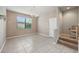 Bright dining area with tile flooring, large window, and an elegant chandelier at 5962 Lexington Dr, Parrish, FL 34219