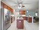 Well-equipped kitchen featuring stainless steel appliances, granite countertops, and ample cabinet space at 5962 Lexington Dr, Parrish, FL 34219