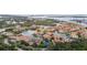 Aerial view of community, lake and coastline showcasing the surrounding area at 6 Academy S Way # 221, St Petersburg, FL 33711