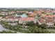 Beautifully maintained condominiums nestled on the waterfront, surrounded by mature palm trees and lush green lawns at 6 Academy S Way # 221, St Petersburg, FL 33711