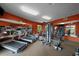 Well-equipped fitness center with treadmills, weights, and mirrored walls at 6 Academy S Way # 221, St Petersburg, FL 33711