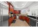 This spacious kitchen features stainless steel appliances, sleek countertops, and a wine fridge at 6 Academy S Way # 221, St Petersburg, FL 33711