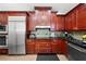 Well-equipped kitchen with stainless steel appliances, ample cabinetry, and a convenient layout at 6 Academy S Way # 221, St Petersburg, FL 33711