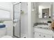 Bathroom with a glass shower and a modern vanity with marble countertop at 6119 31St N Ave, St Petersburg, FL 33710