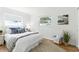 Cozy bedroom with natural light, stylish bedding, and a comfortable atmosphere at 6119 31St N Ave, St Petersburg, FL 33710