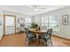 Bright dining area with tile floors, large windows, and stylish table, perfect for gatherings at 6119 31St N Ave, St Petersburg, FL 33710