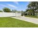 Charming single-story home with fenced yard, a spacious driveway, and well-maintained landscaping at 6119 31St N Ave, St Petersburg, FL 33710