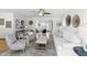 Bright living room with neutral decor, hardwood floors, ceiling fan and an inviting space for relaxation at 6119 31St N Ave, St Petersburg, FL 33710