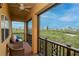 Enjoy the scenery from this balcony, offering views of greenery and the neighborhood at 6513 Sand Shore Ln, New Port Richey, FL 34652